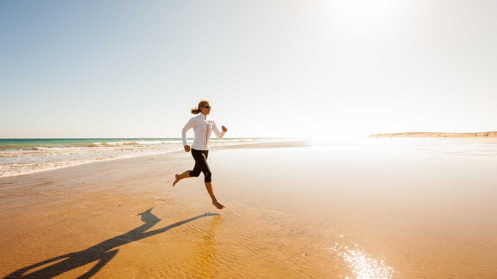 Woman Jogging In Sunlight